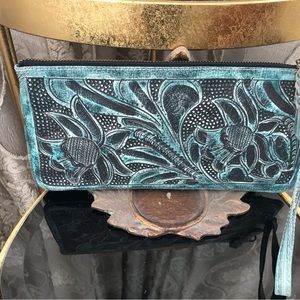 Hand tooled leather clutch in aqua